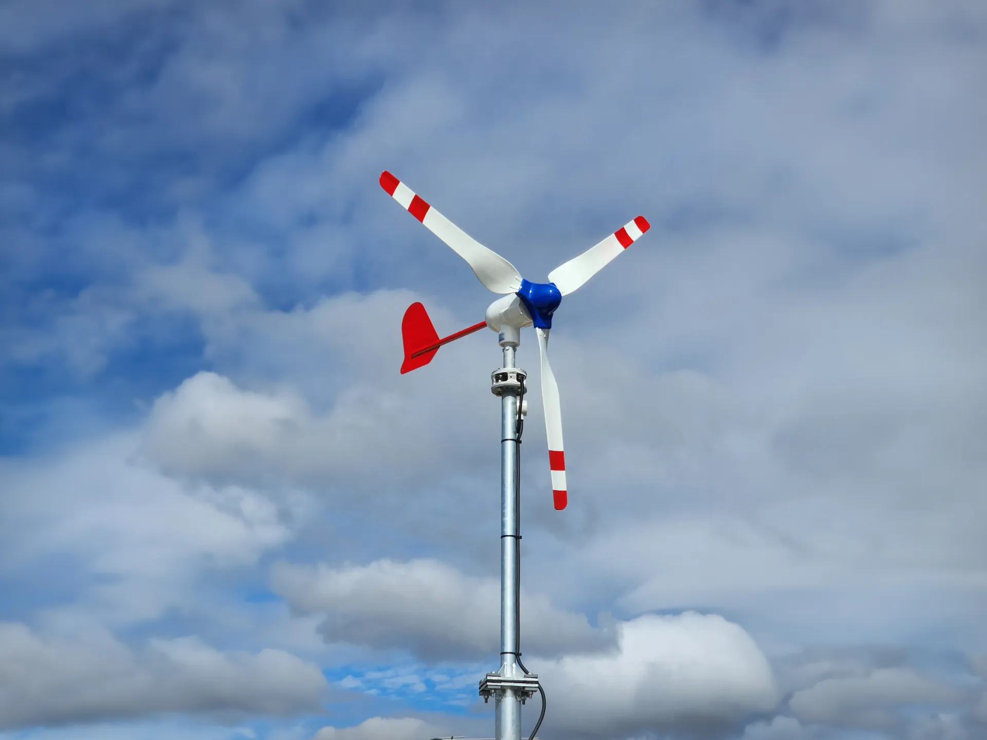 A photo of a wind turbine by TerrSat.
